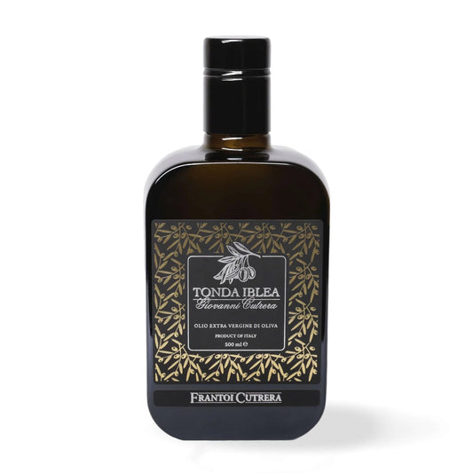 Bottle of Tonda Iblea olive oil with decorative label on a white background