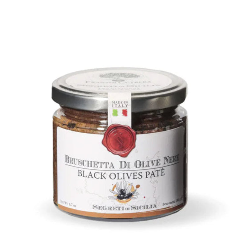 Jar of black olives pate with a label on a white background
