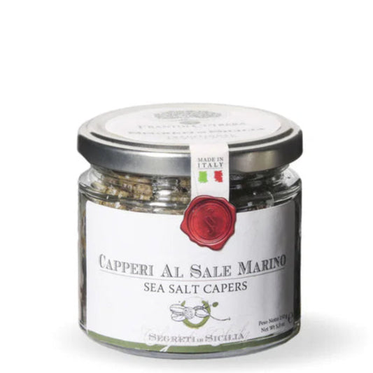 Jar of sea salt capers with a label on a white background