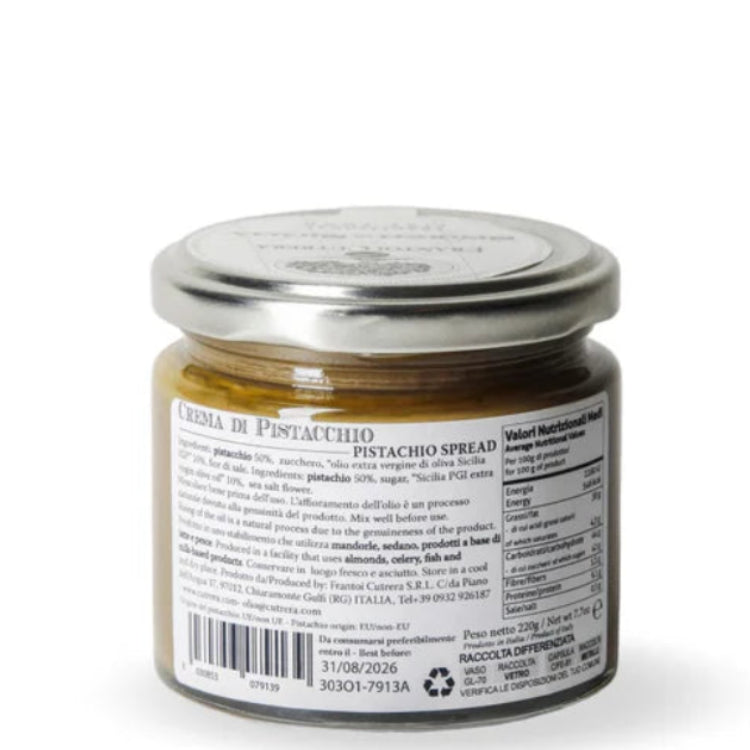 Jar of pesto on a white background